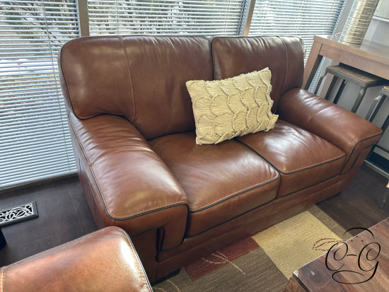 Chestnut Top Grain Leather Loveseat W/Accent Stitching Black Edging