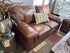 Chestnut Top Grain Leather Loveseat W/Accent Stitching Black Edging