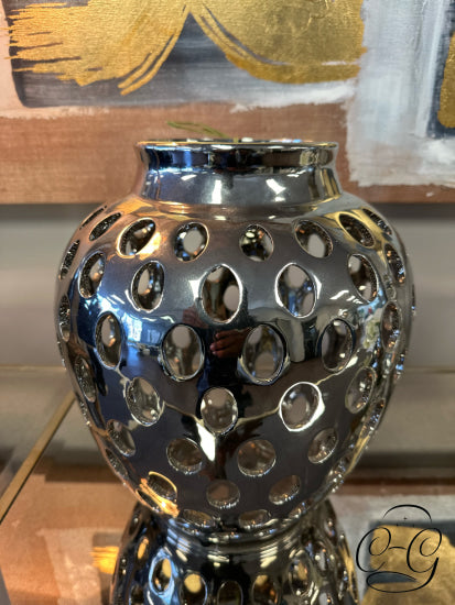 Chrome Finish Round Vase With Cut Out Circle Exterior