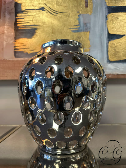 Chrome Finish Round Vase With Cut Out Circle Exterior