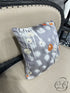 Grey Toss Pillow With Orange Ivory White Design