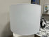 White Ceramic Base Table Lamp With Line Pattern Shade